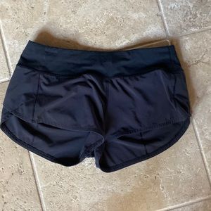 Like new,  Black Size 4 Lululemon running shorts 2 1/2” inseam.